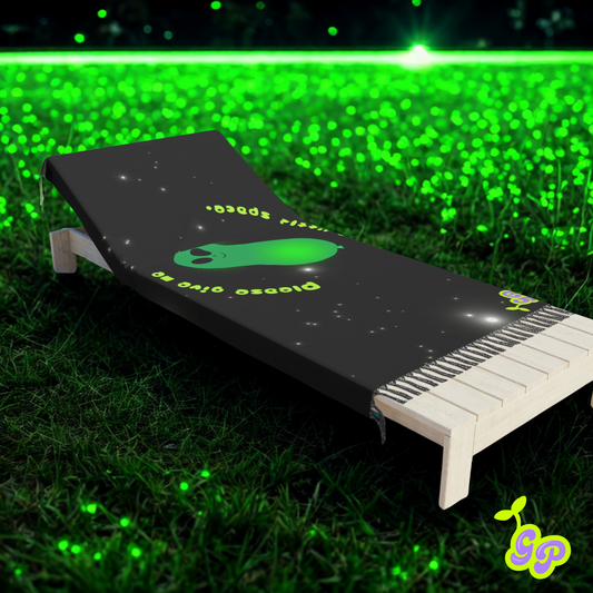 Glowing green alien balloon pashmina draped over a lounge chair at night, surrounded by fireflies; dreamy EDM festival vibe.